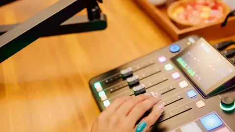 Podcast studio equipment including microphones and mixer